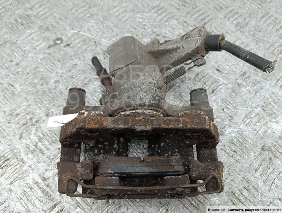 Суппорт задний левый