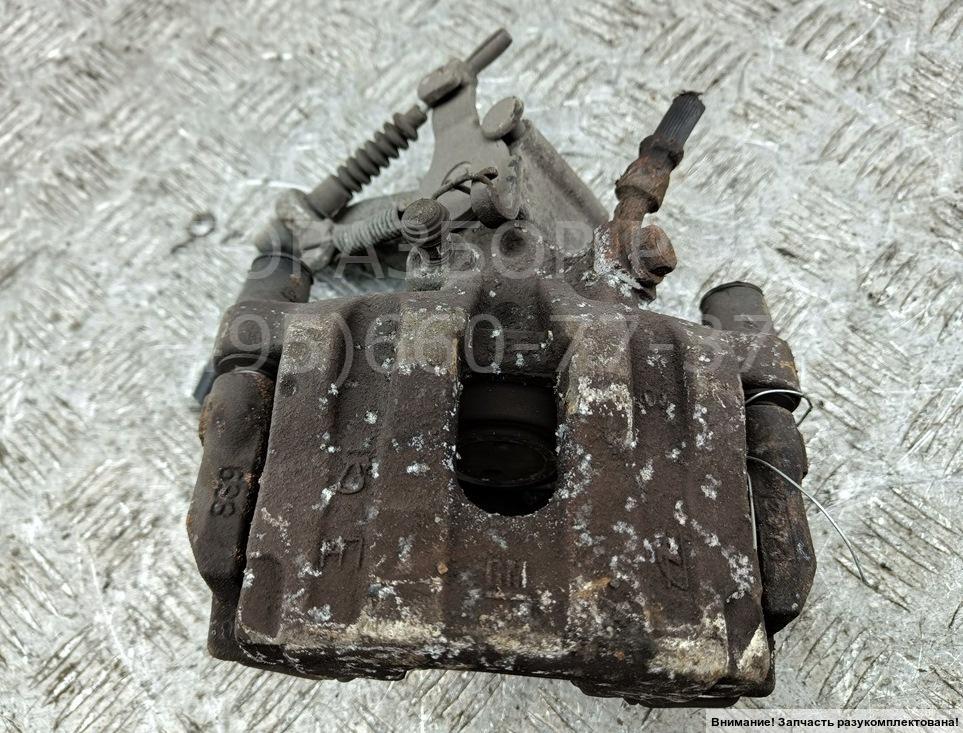 Суппорт задний левый