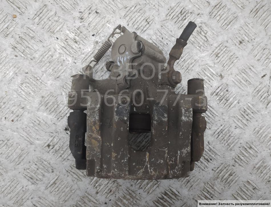 Суппорт задний левый