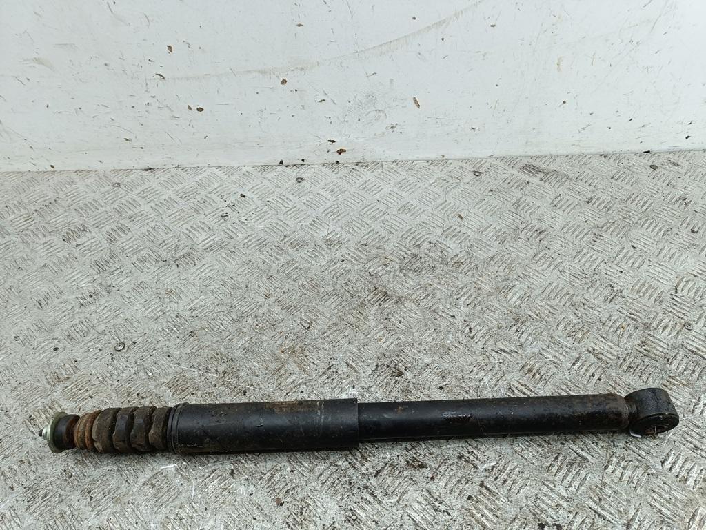 Амортизатор задний левый