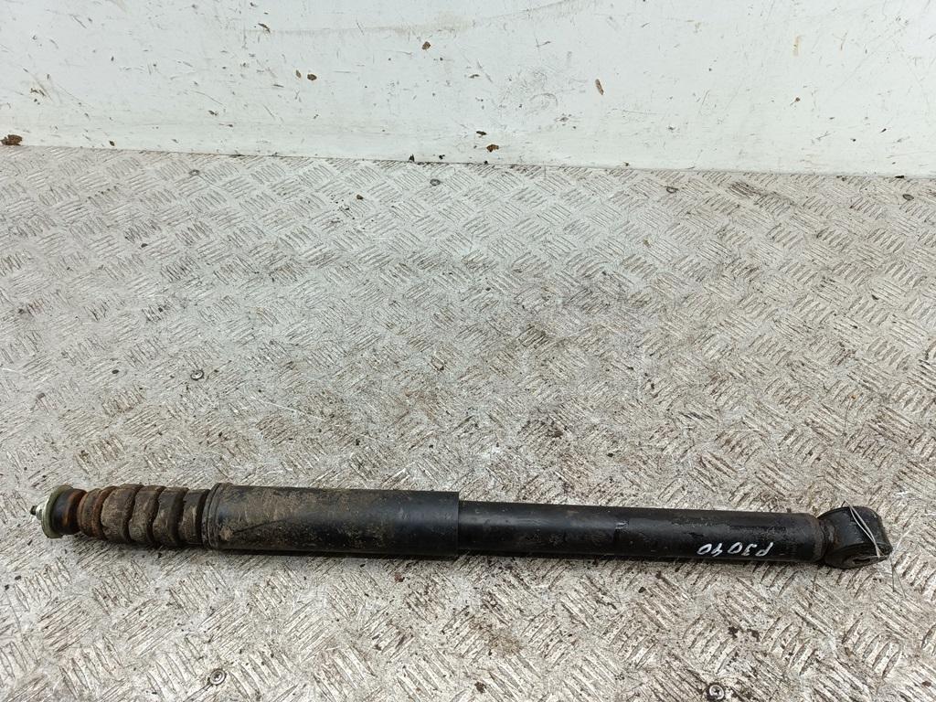 Амортизатор задний левый