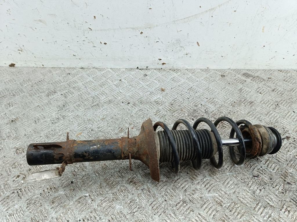 Амортизатор передний левый