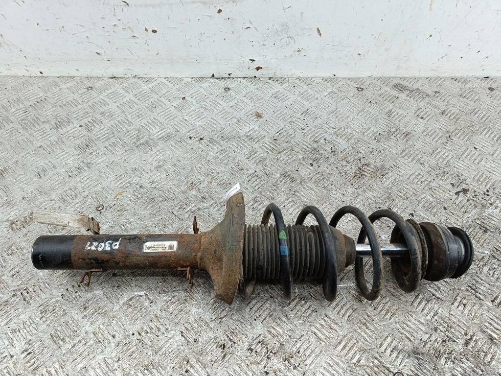 Амортизатор передний левый