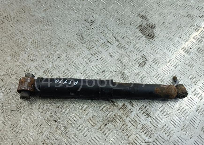 Амортизатор задний левый