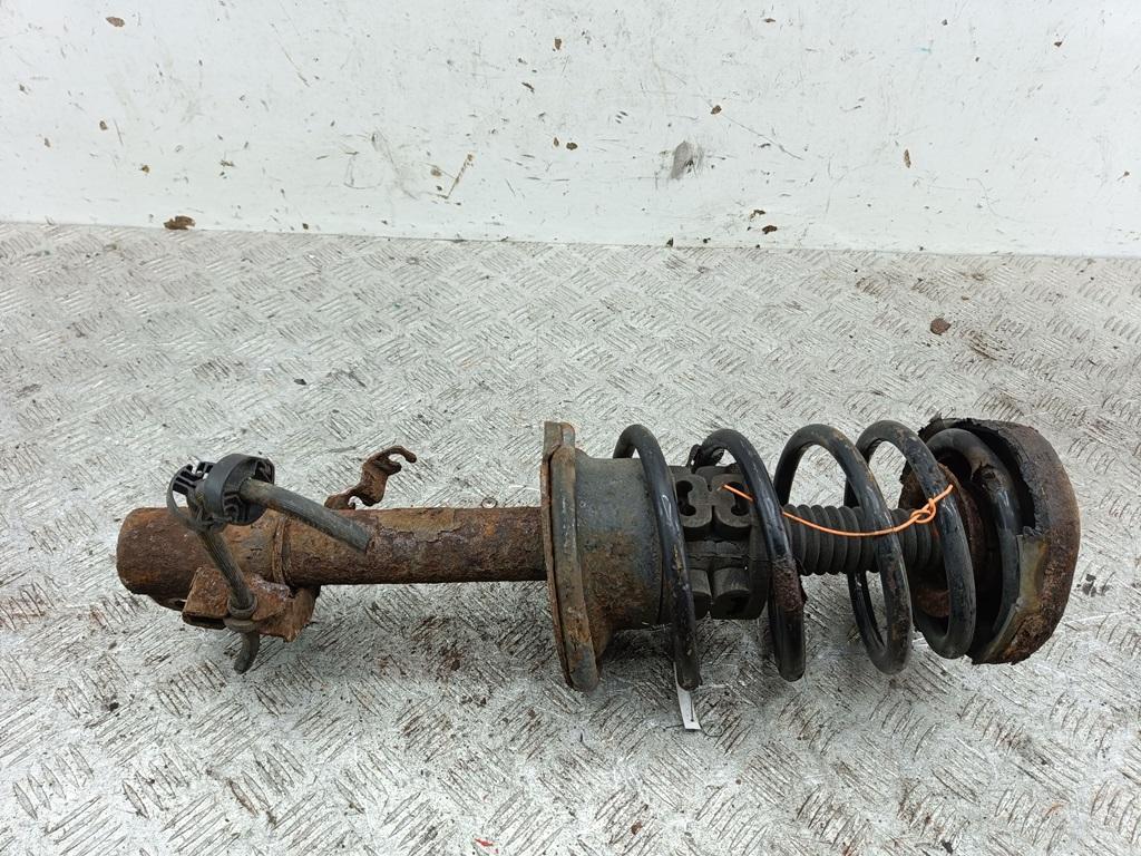 Амортизатор передний левый