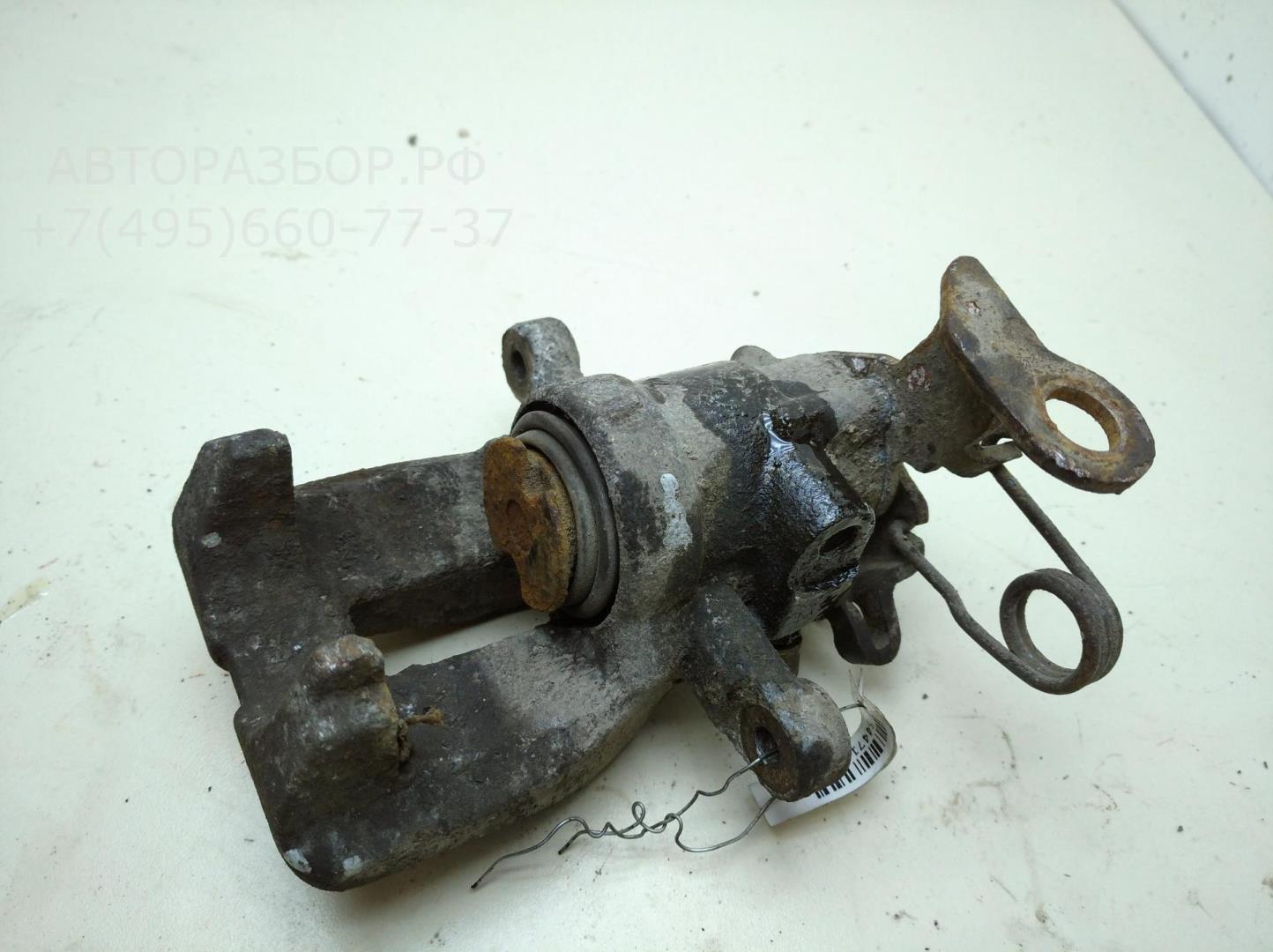 Суппорт задний левый