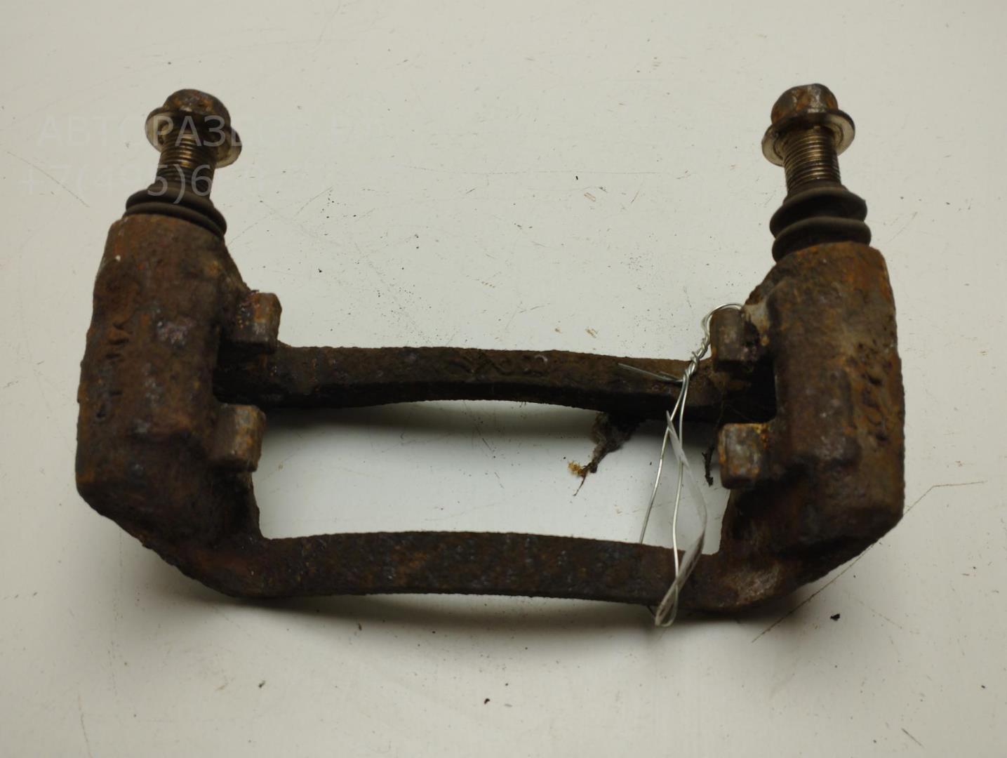 Скоба суппорта заднего