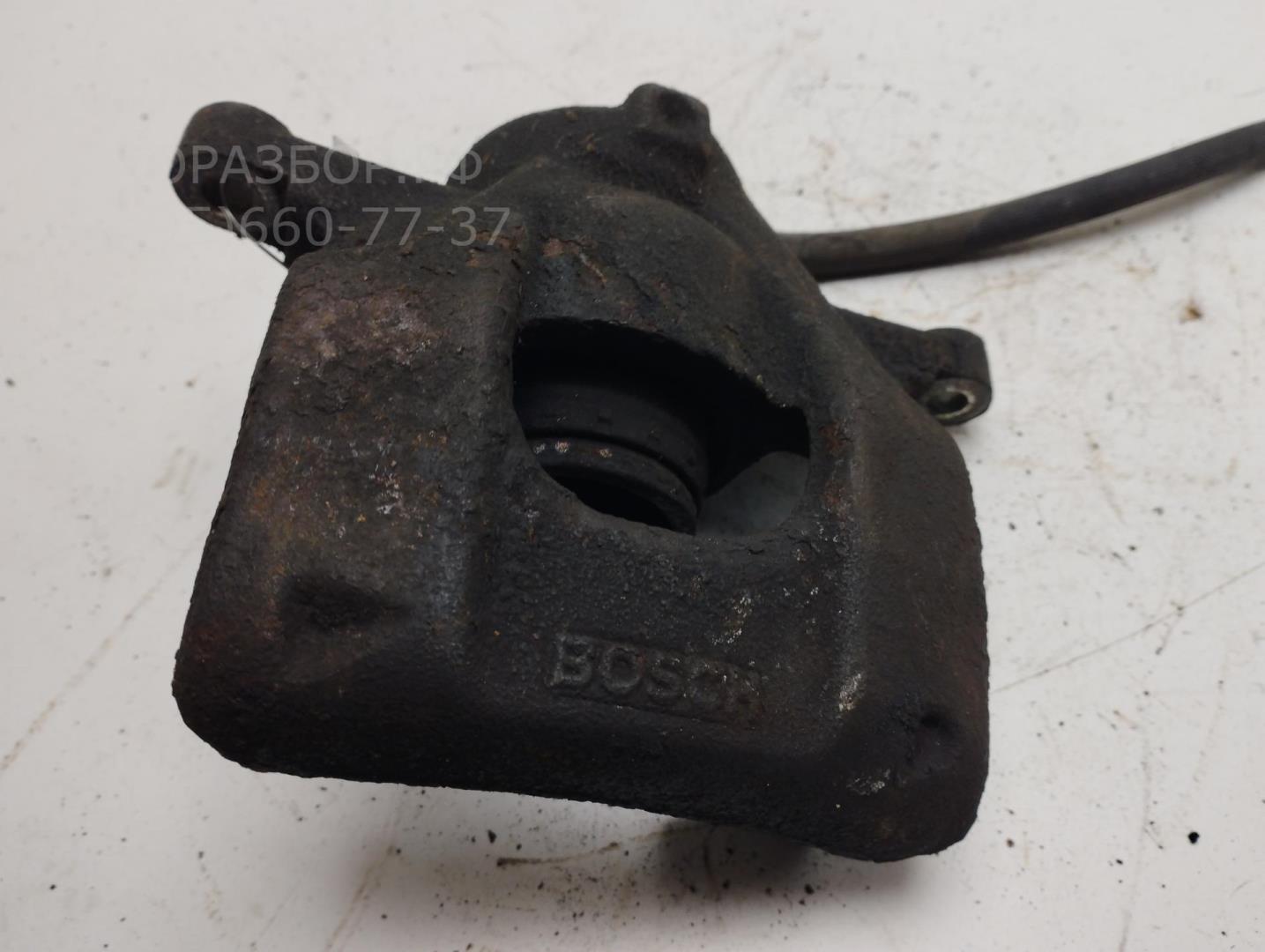 Суппорт передний левый