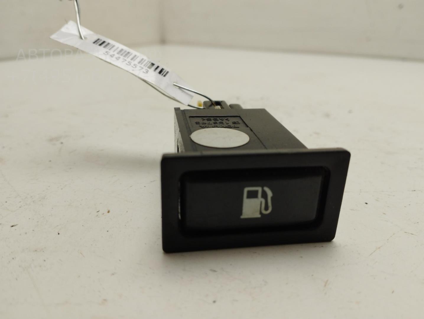 Кнопка открывания лючка бензобака