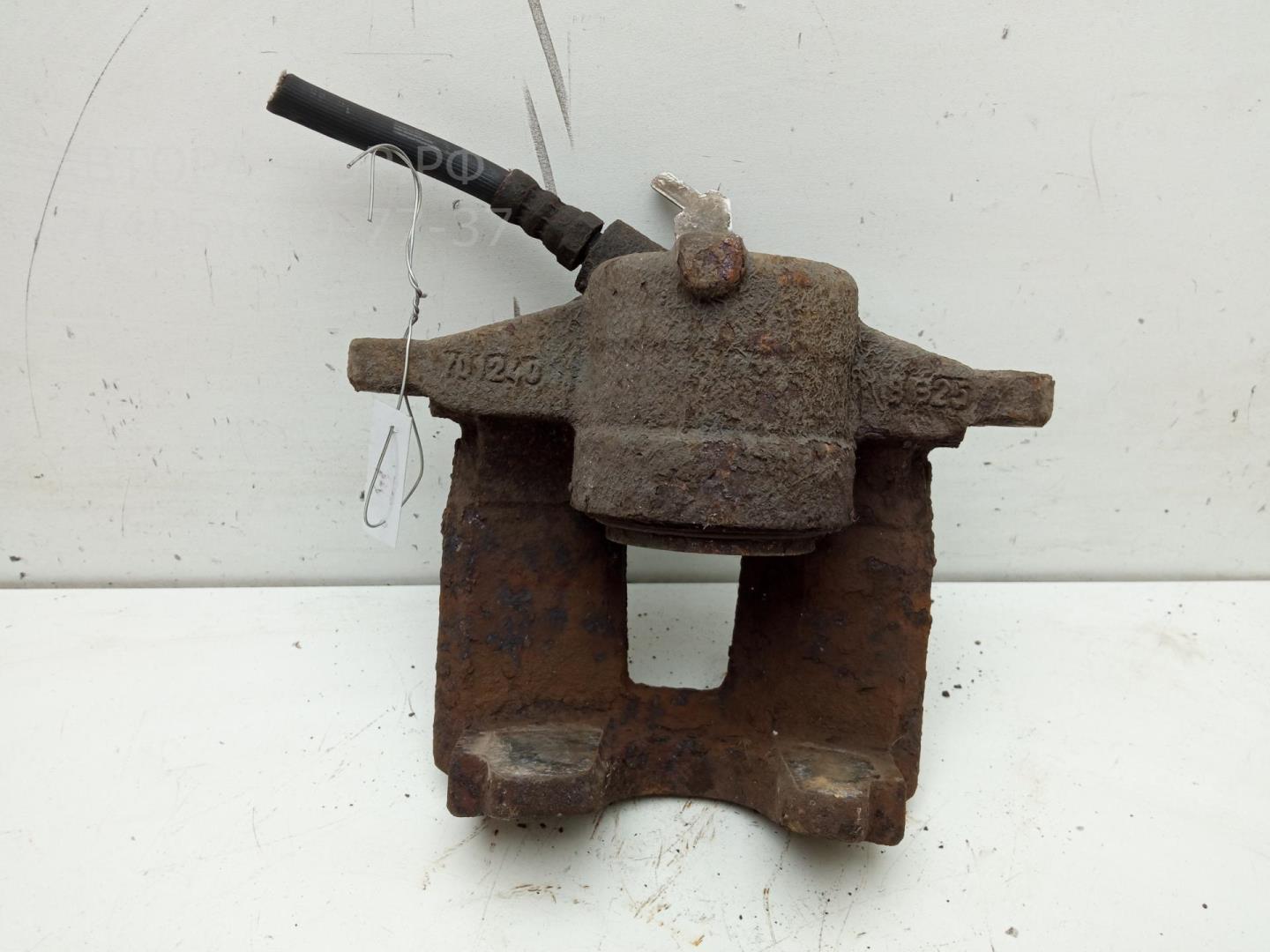 Суппорт передний левый