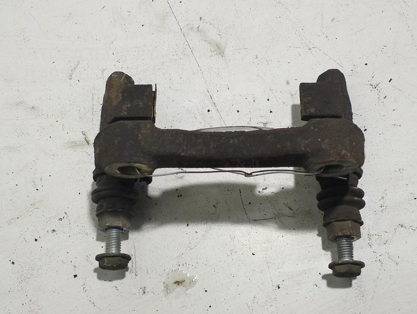 Скоба суппорта заднего