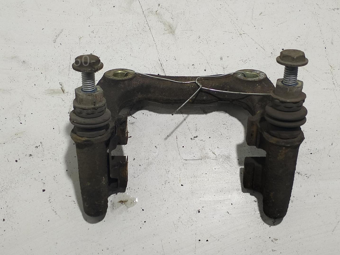 Скоба суппорта заднего