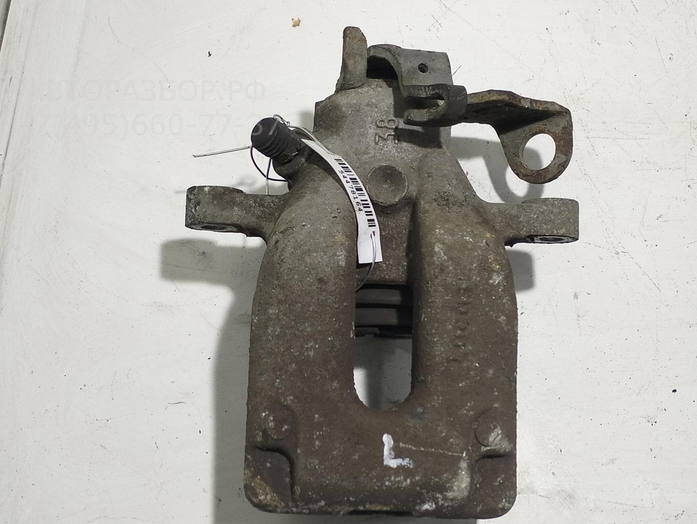 Суппорт задний левый