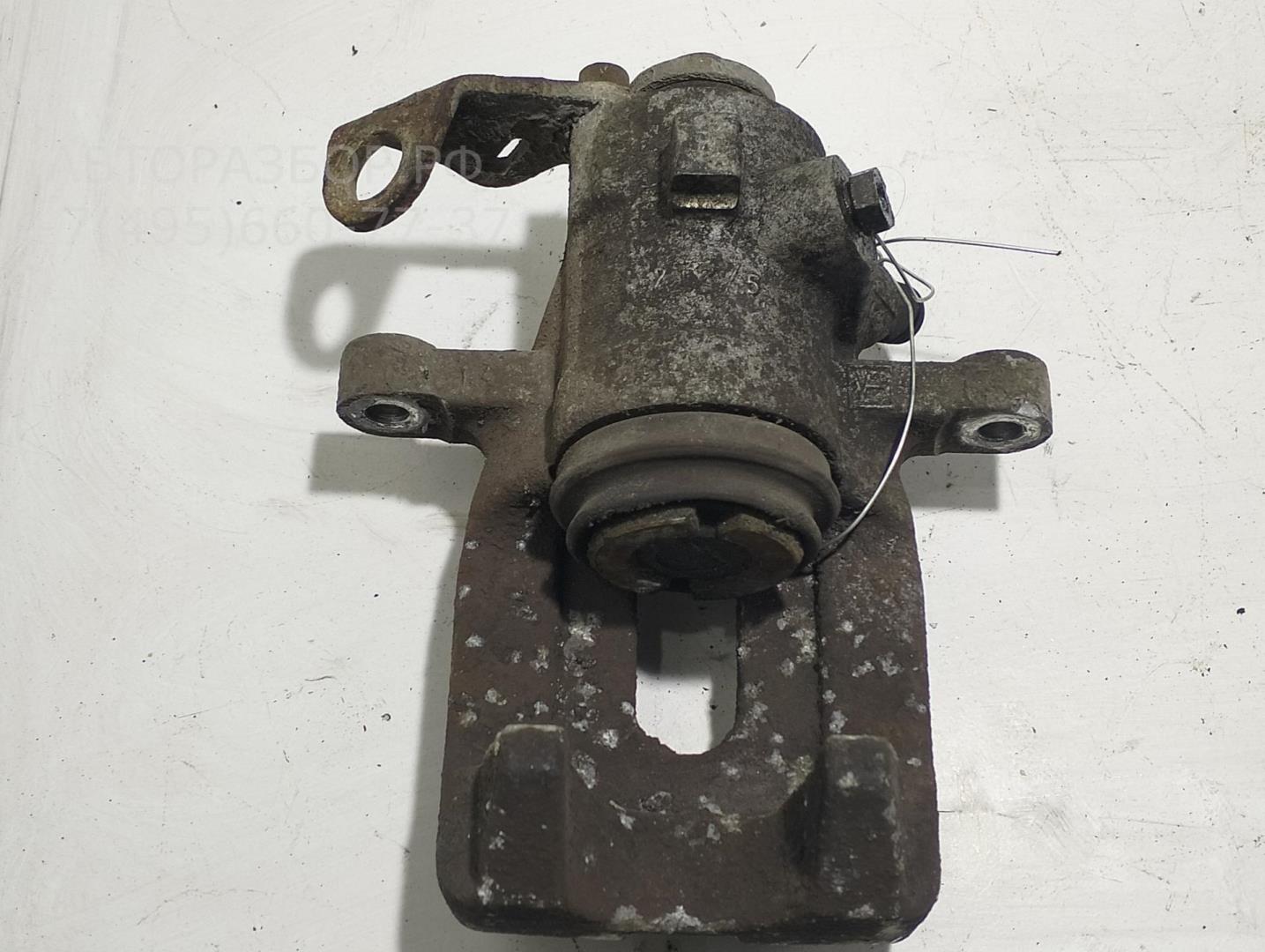 Суппорт задний левый