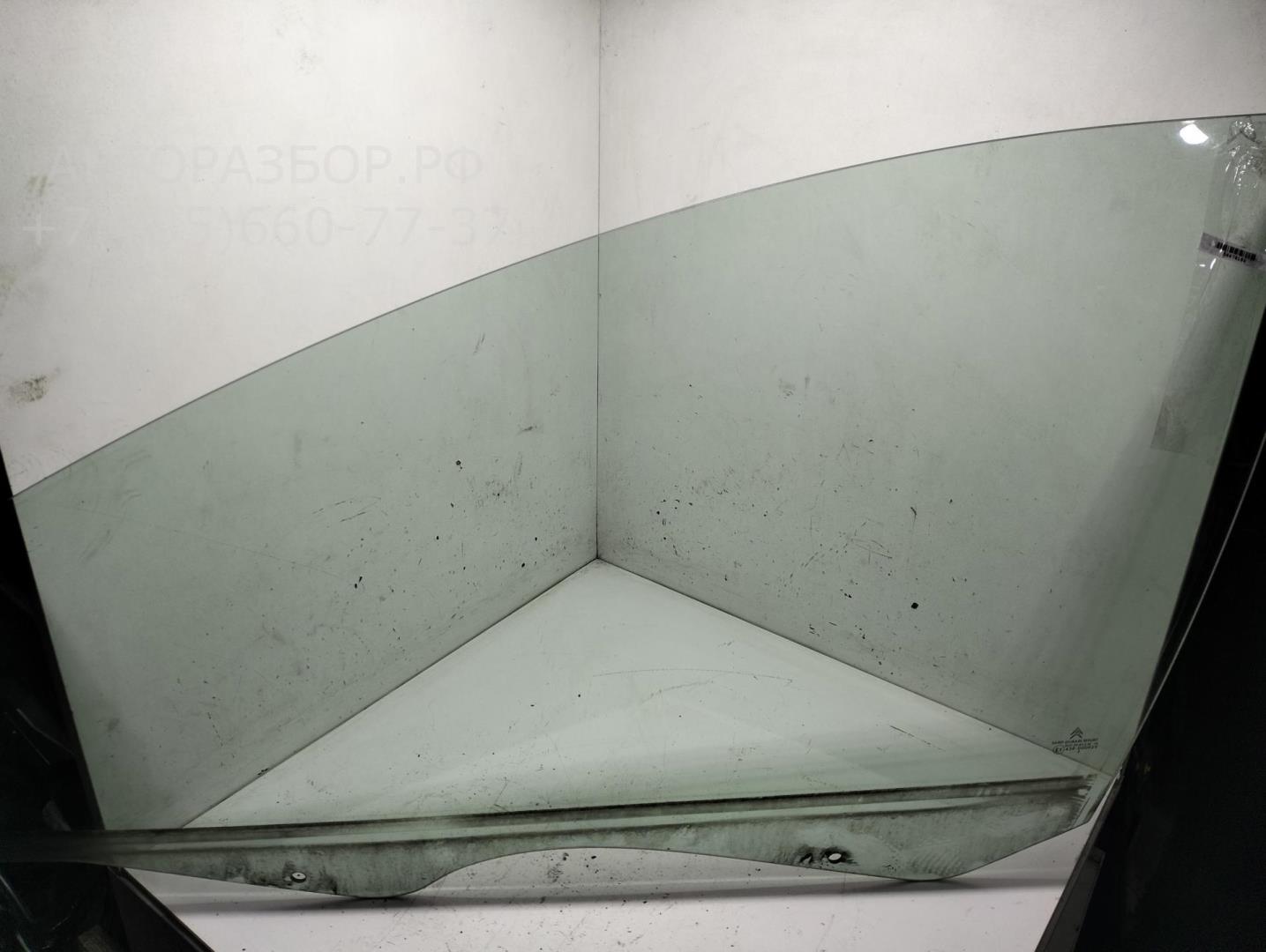 Стекло двери передней левой
