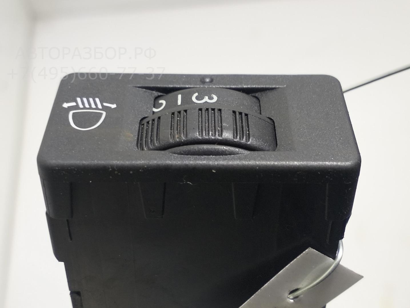 Кнопка корректора фар