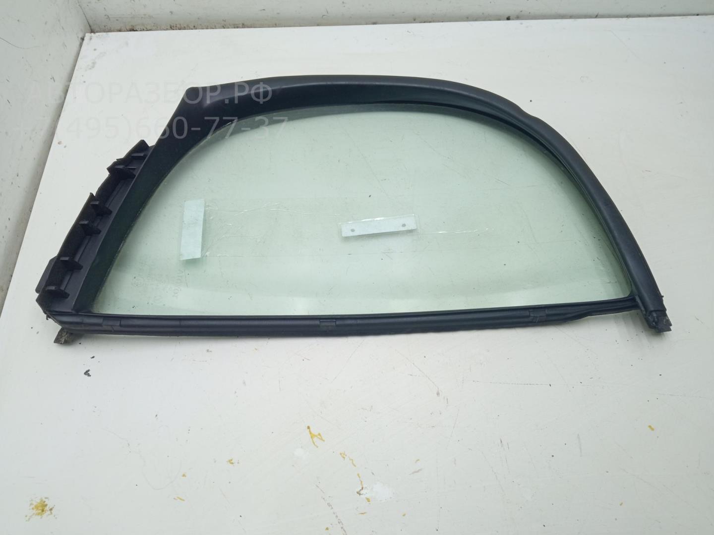 Стекло двери задней левой (форточка)