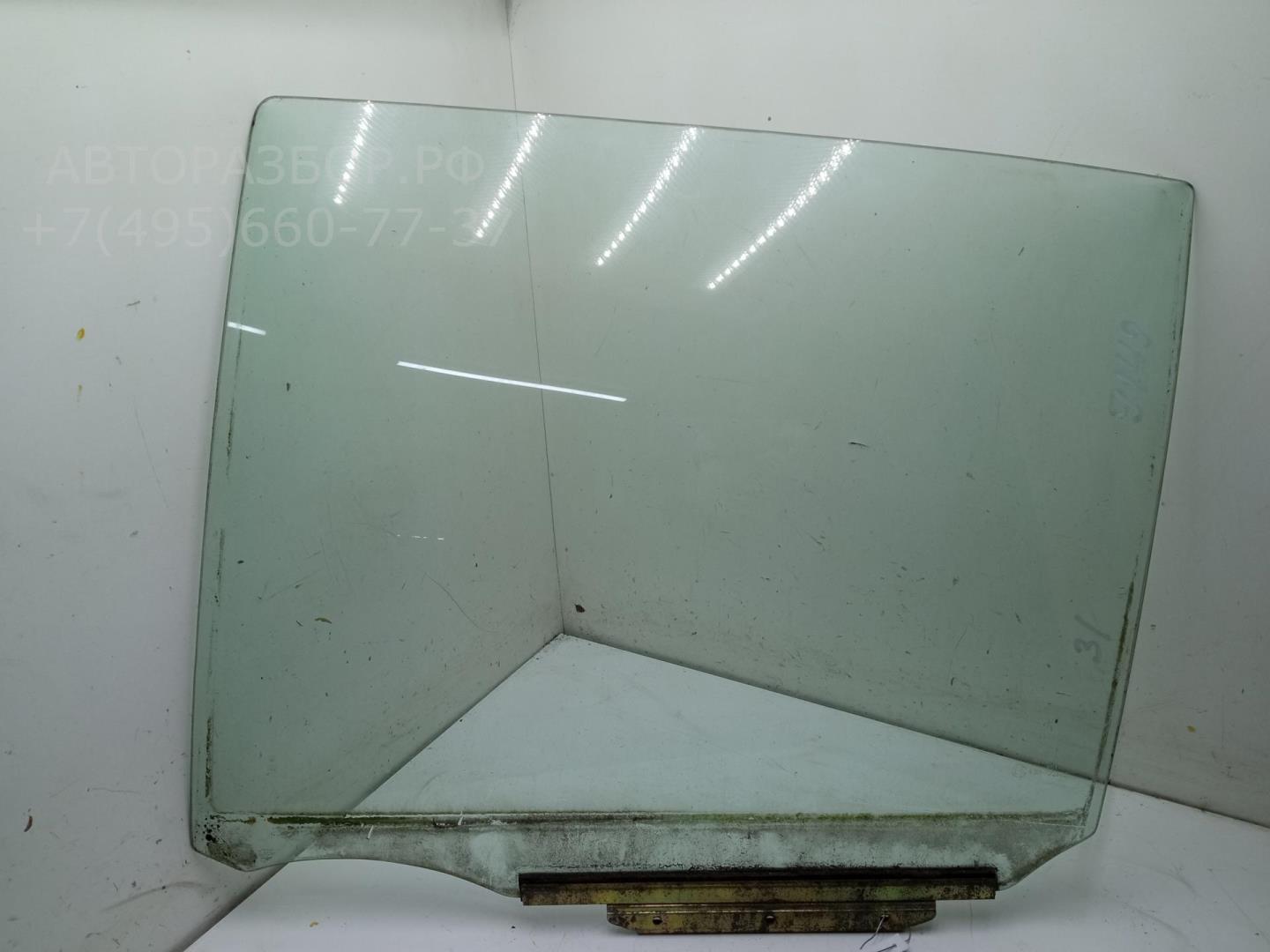 Стекло двери задней левой