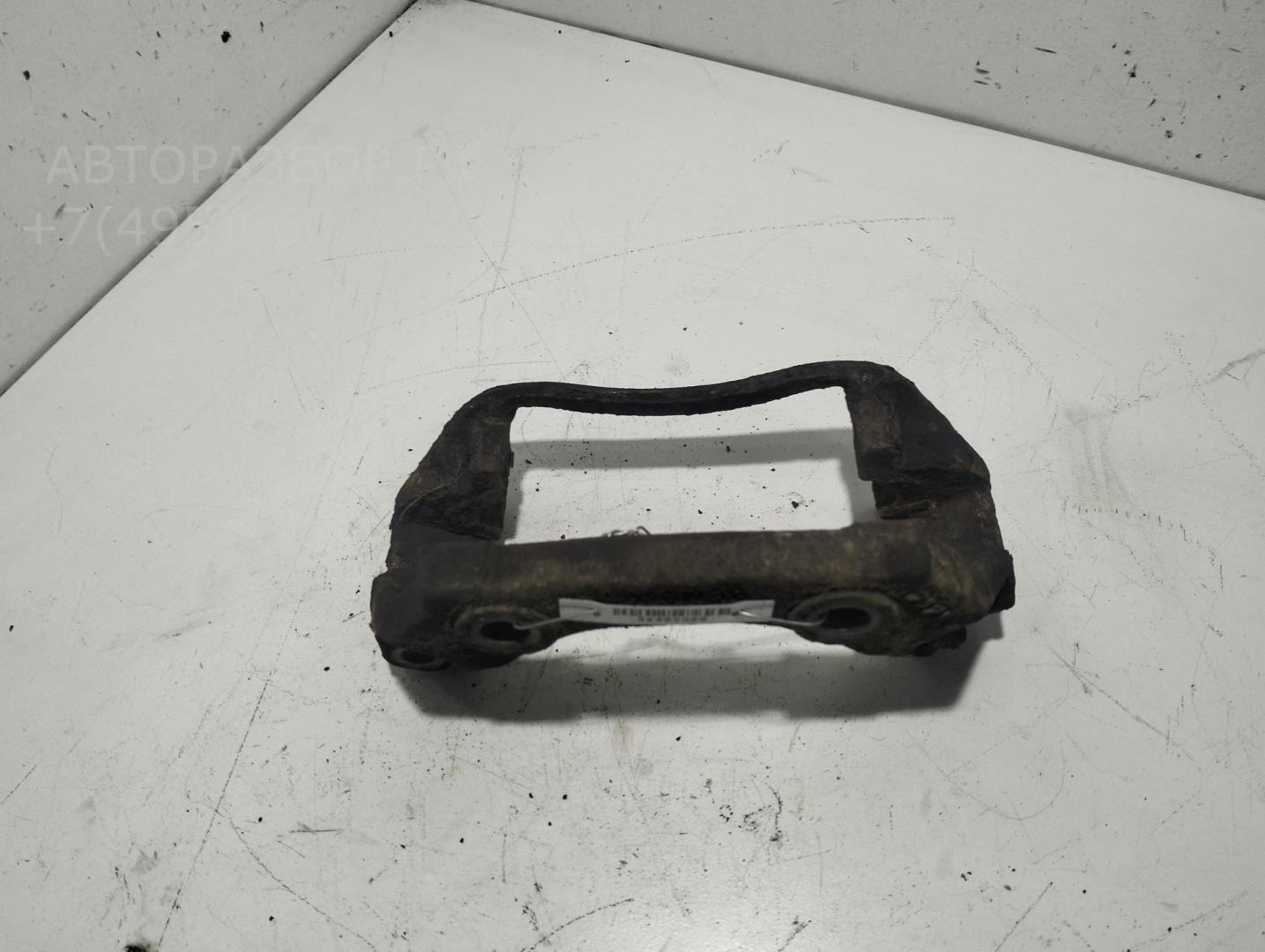 Скоба суппорта переднего