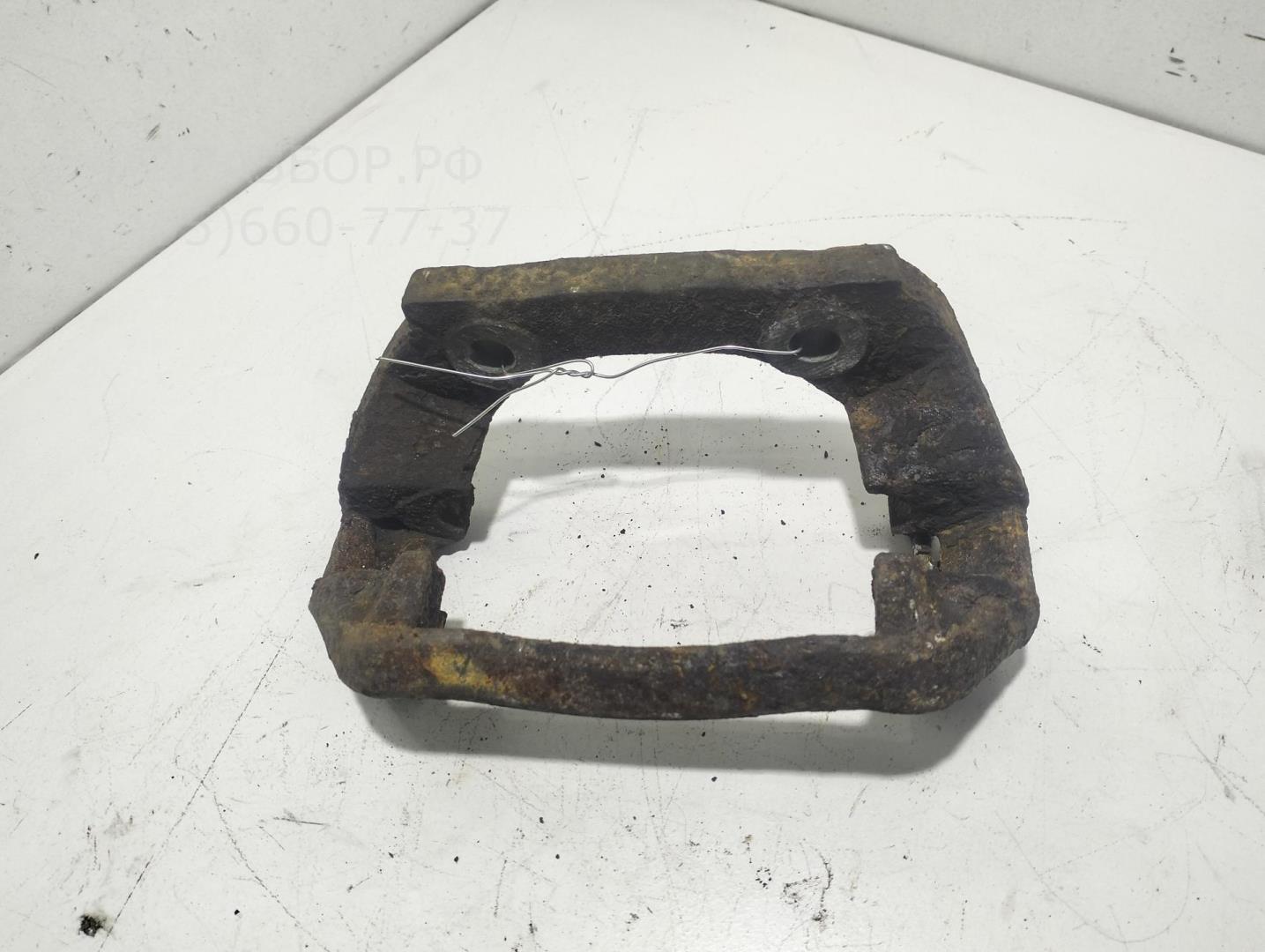 Скоба суппорта переднего