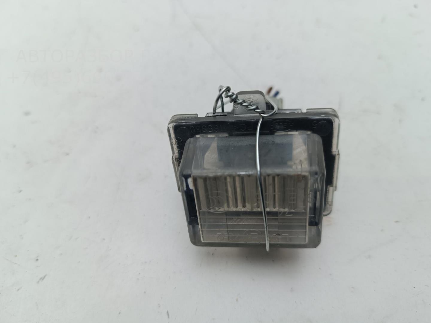 Фонарь подсветки номера