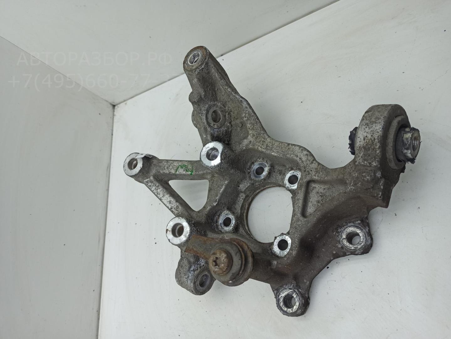 Кулак поворотный задний левый