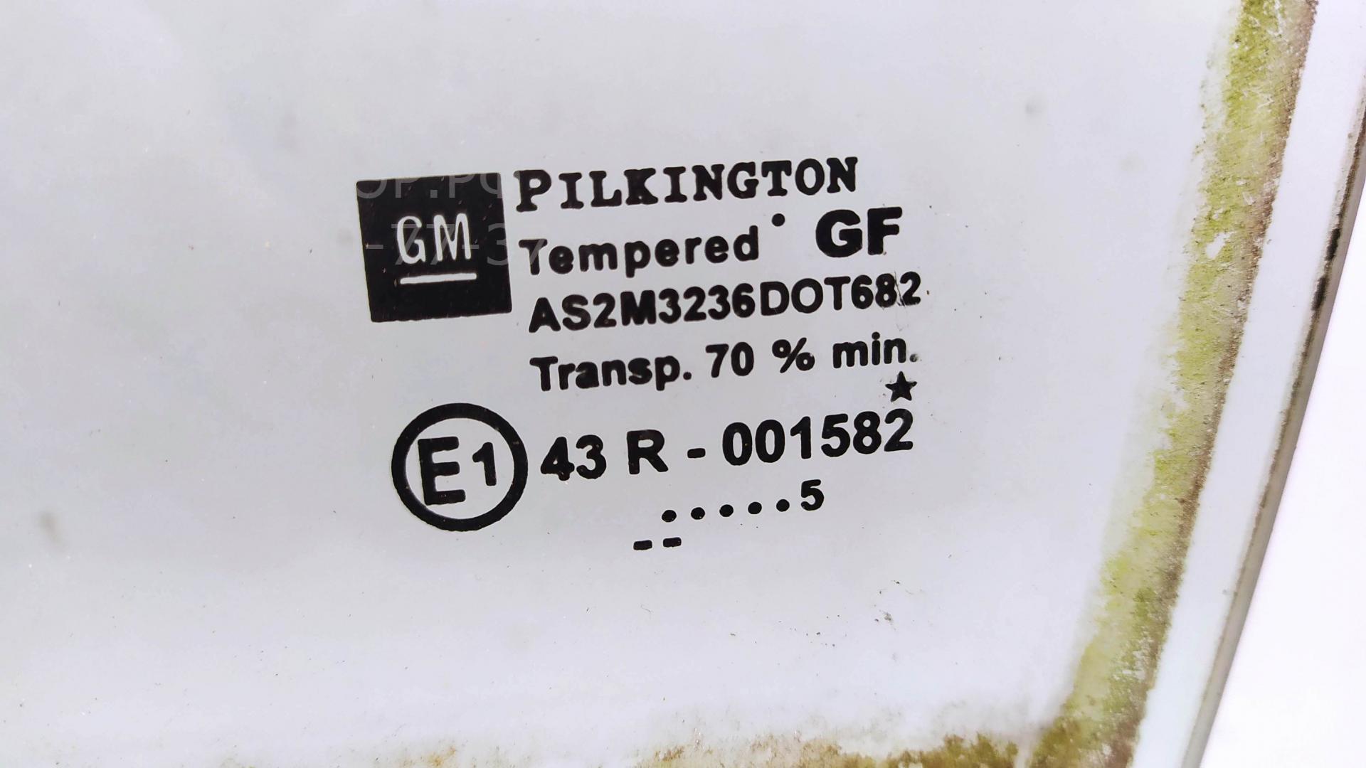 Стекло двери задней левой