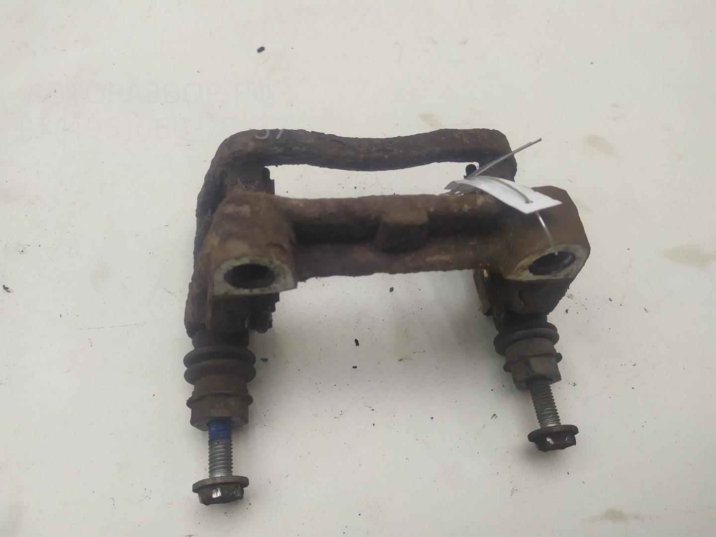 Скоба суппорта заднего