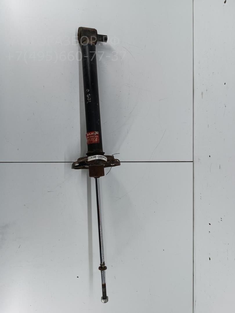 Амортизатор задний левый