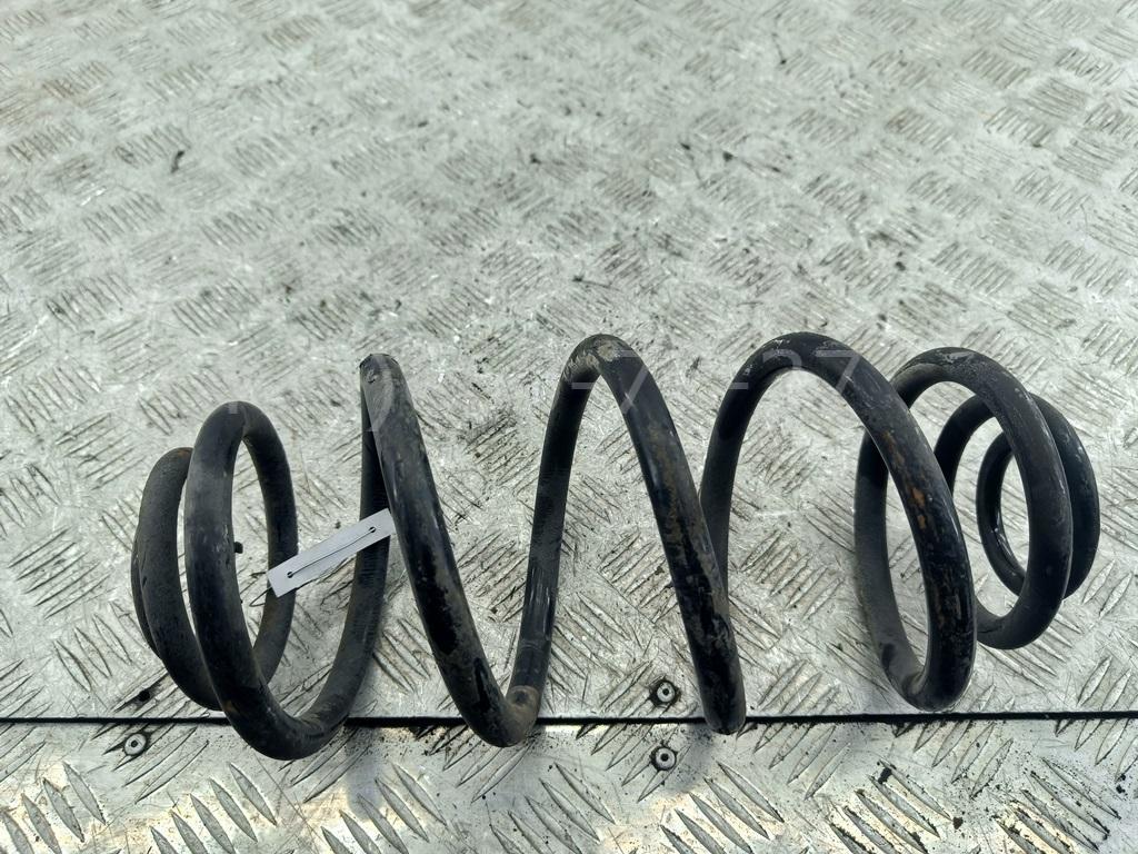 Пружина задняя
