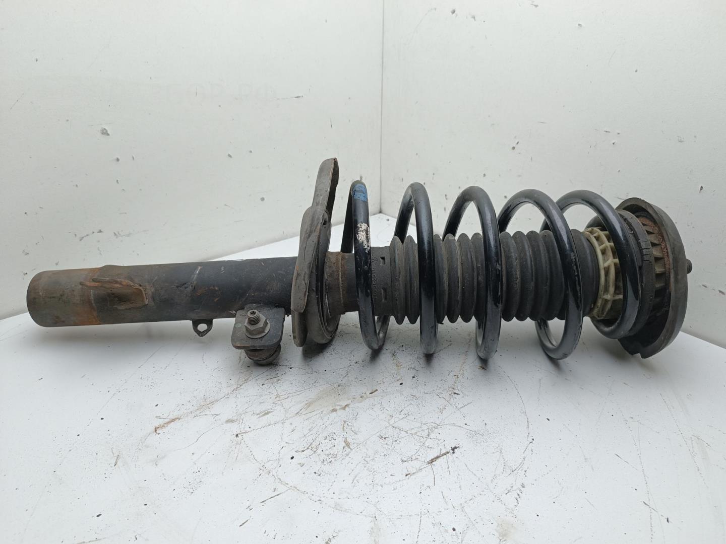 Амортизатор передний левый