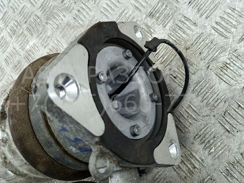 Амортизатор задний левый