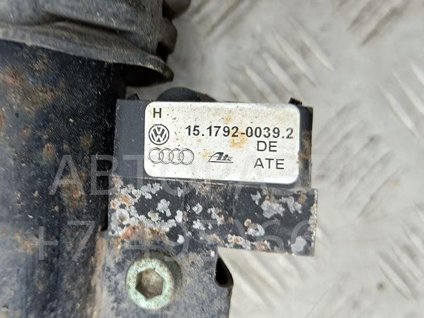 Амортизатор задний левый