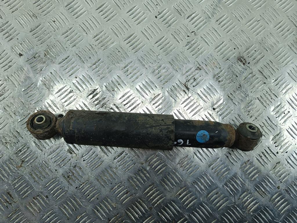 Амортизатор задний левый