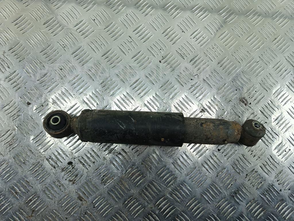 Амортизатор задний левый