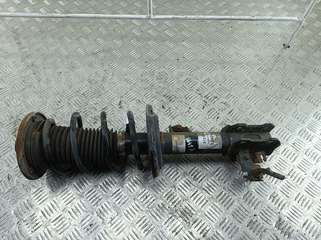 Амортизатор передний левый