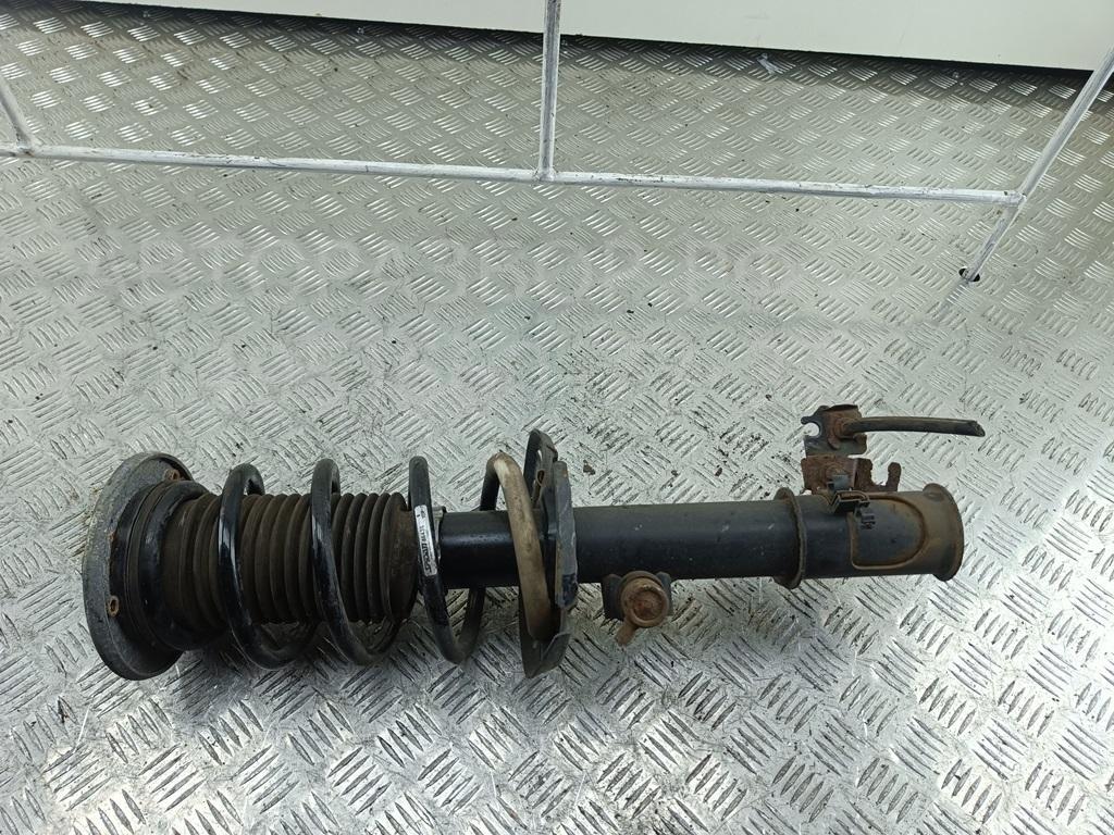 Амортизатор передний левый