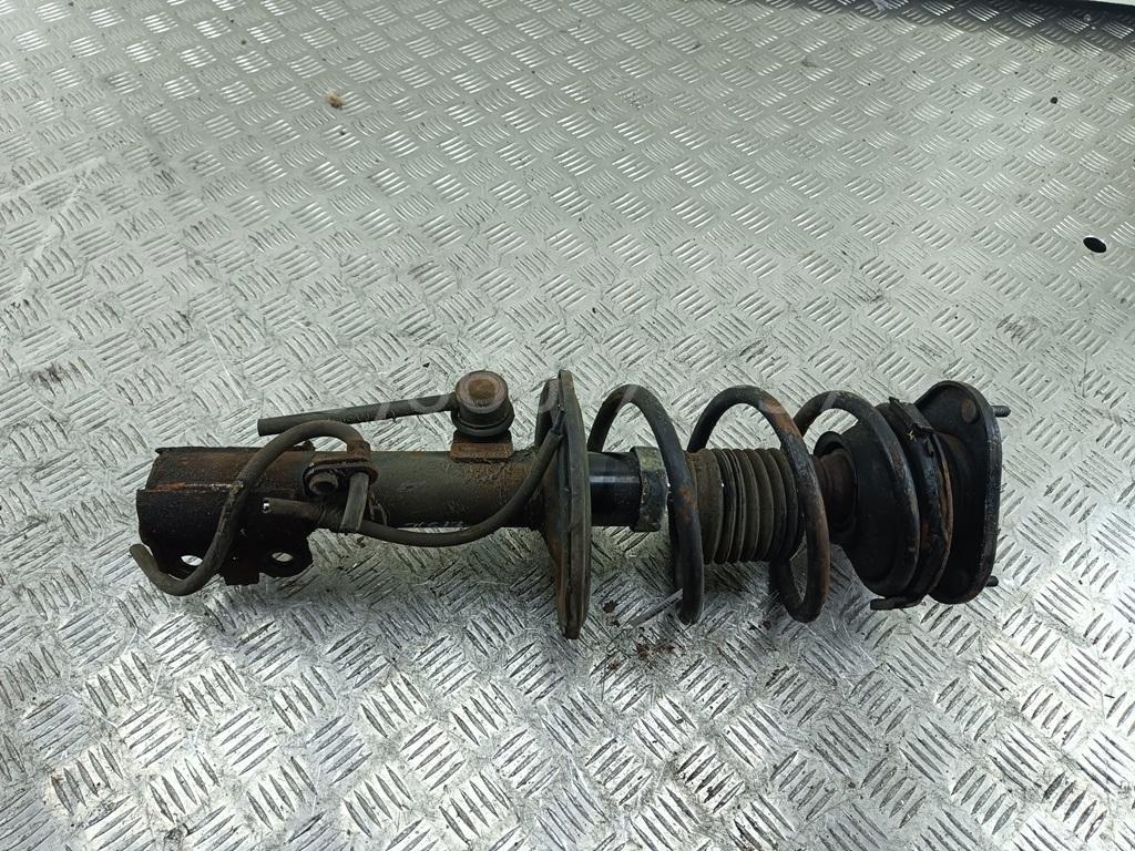 Амортизатор передний левый