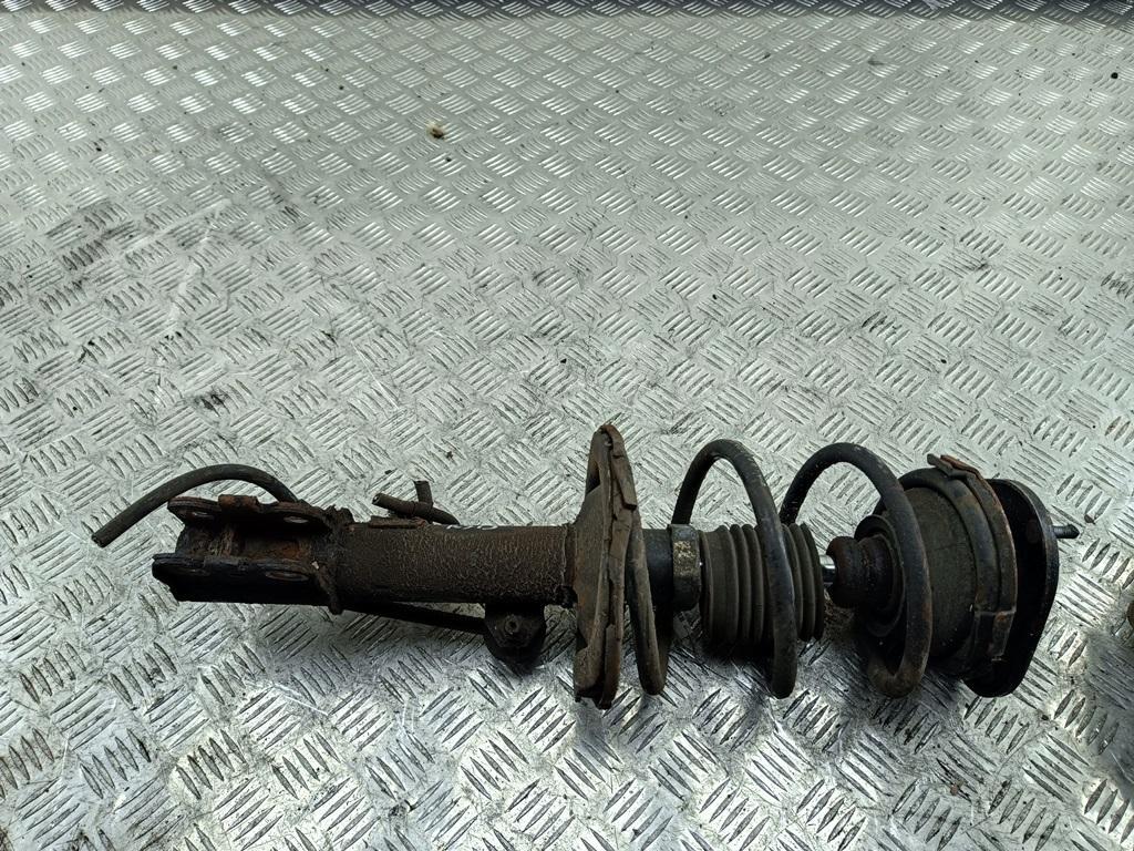 Амортизатор передний левый