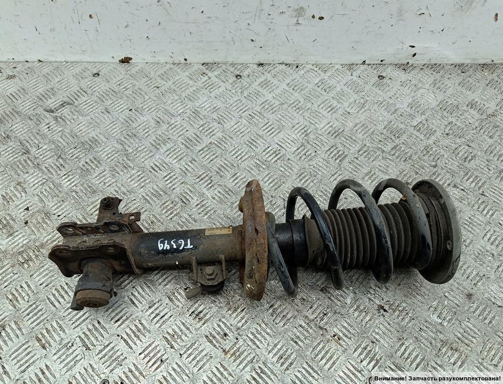 Амортизатор передний левый