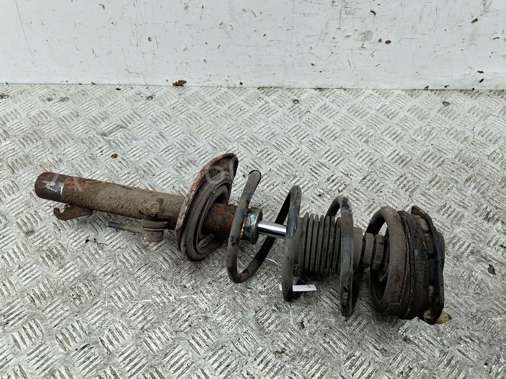 Амортизатор передний левый