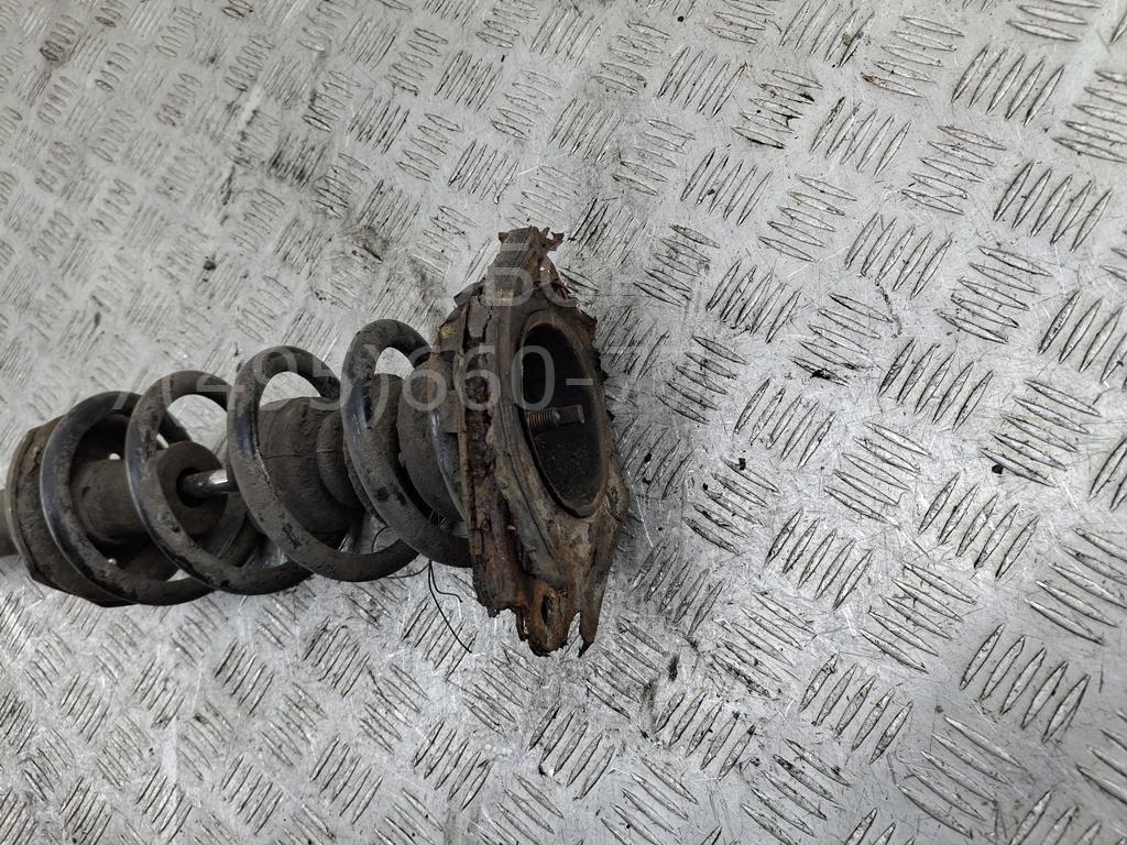 Амортизатор задний левый