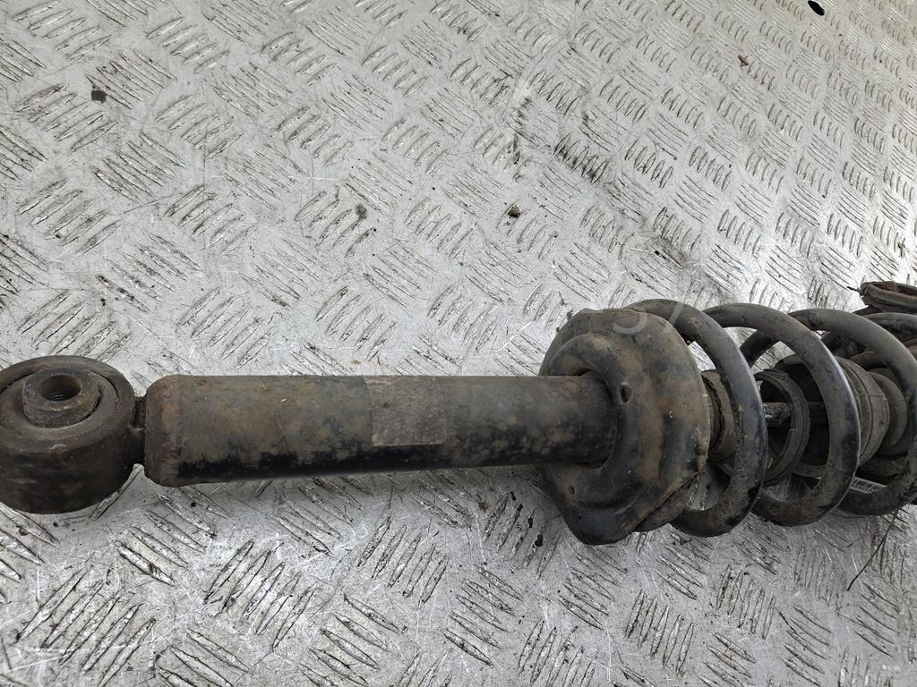 Амортизатор задний левый