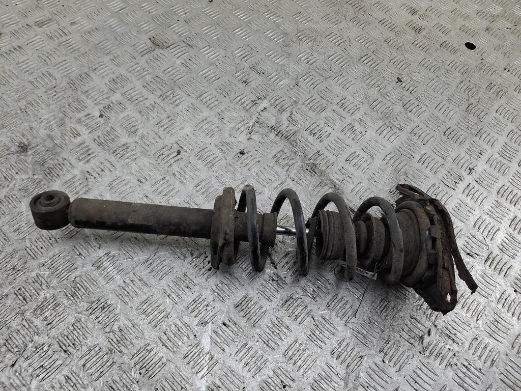 Амортизатор задний левый