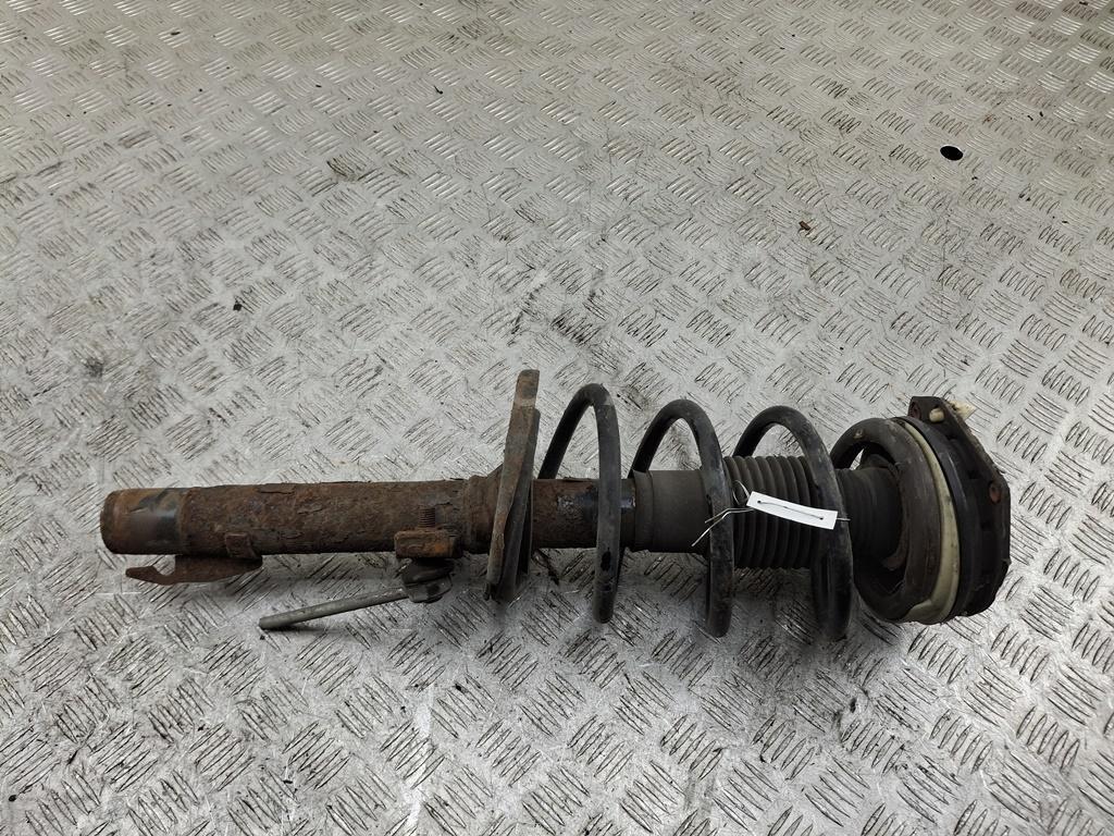 Амортизатор передний левый