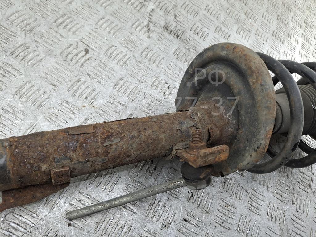 Амортизатор передний левый