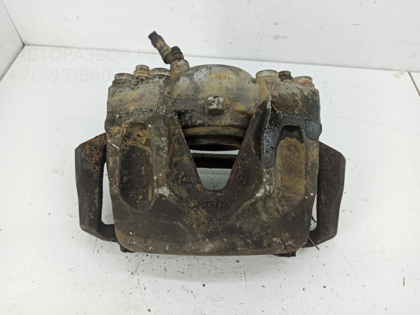 Суппорт передний левый