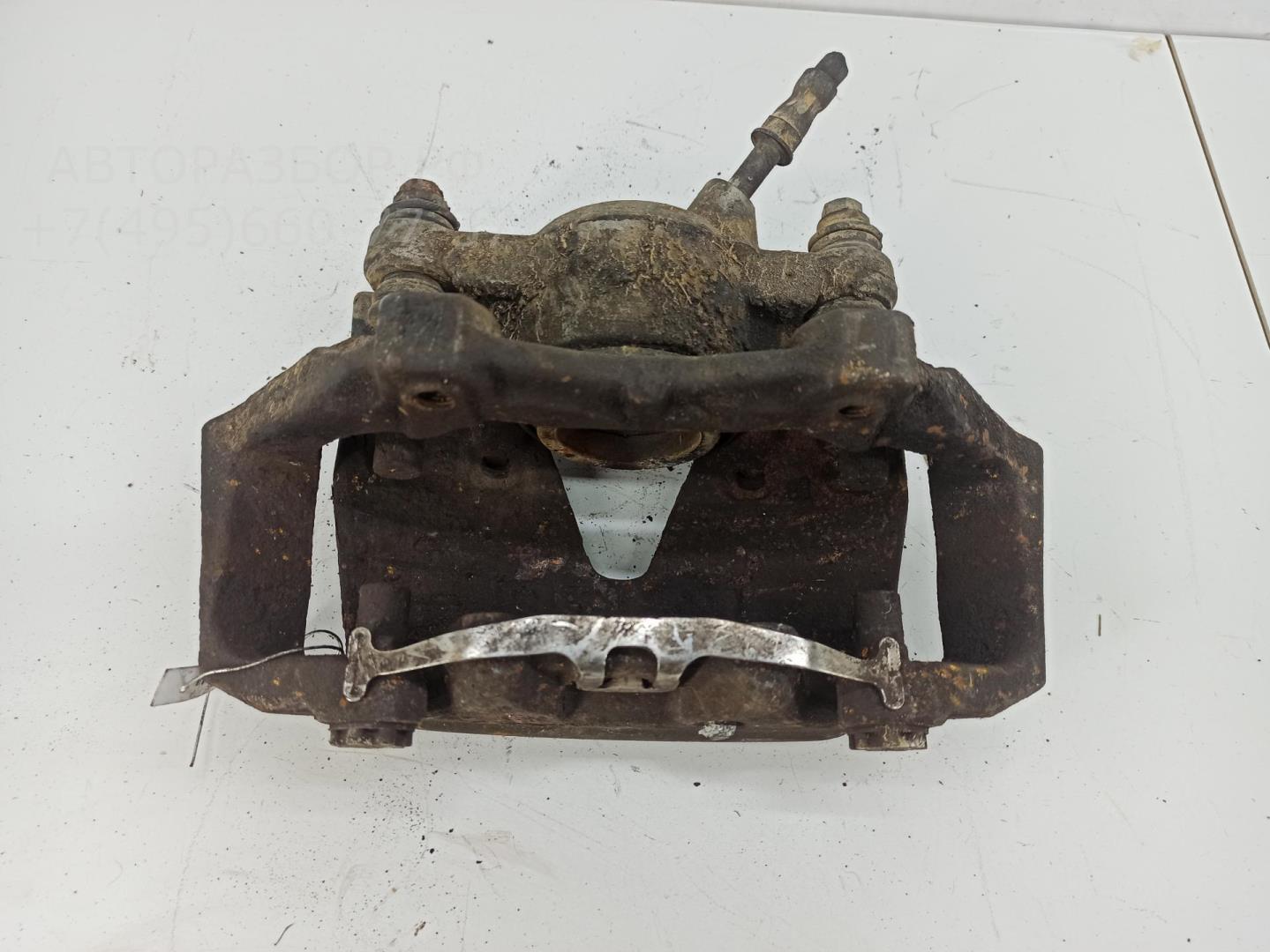 Суппорт передний левый