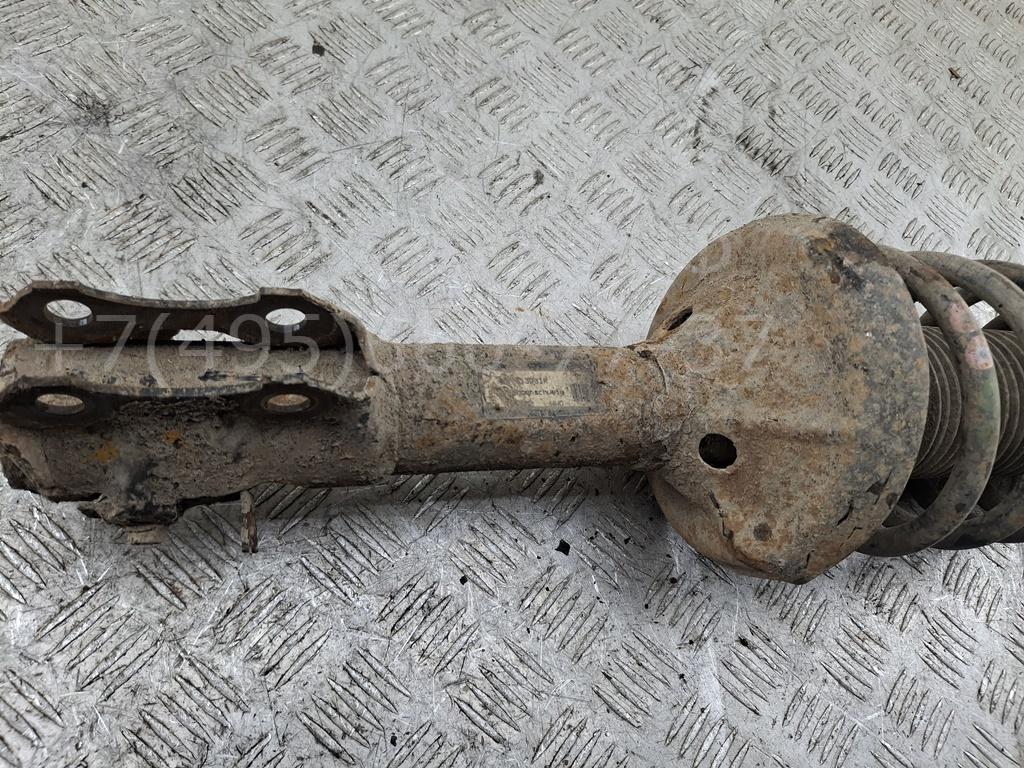 Амортизатор передний левый