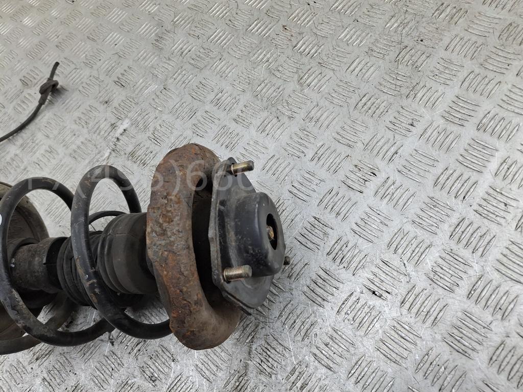 Амортизатор передний левый